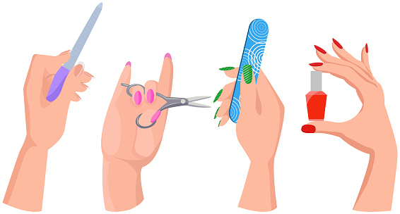 Accessories and tools for working with hand and nails. Scissors, nail file, polish in woman hands