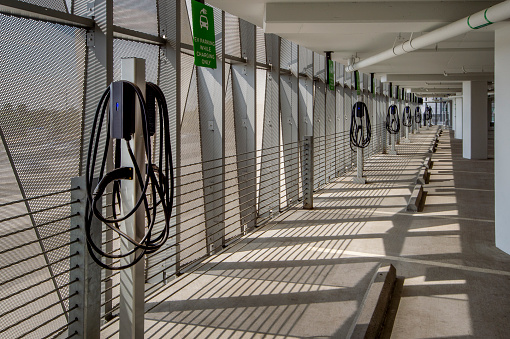 Parking garage with electric charging stations.