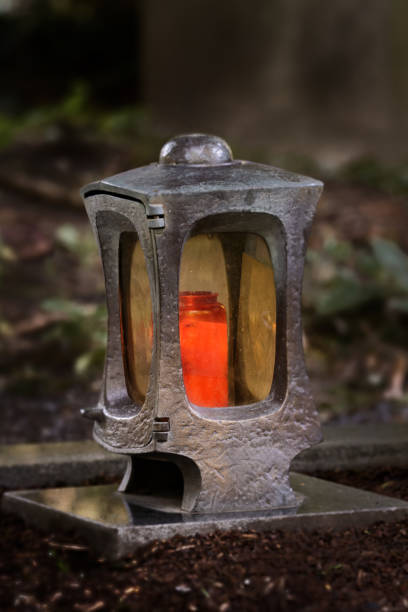 istock funeral lantern in a cemetery at dusk 1426369255