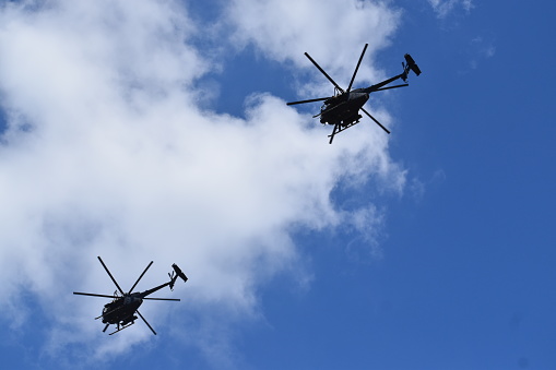 Heavily guarded and armed, Army Helicopters seen over Houston's skies (midday) on September19th, 2022. This is one photo of a set of four.