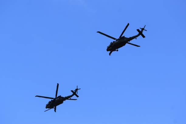テキサス州ヒューストンの空を飛ぶ戦略軍ヘリコプター - 戦隊 ストックフォトと画像