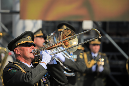 Kyiv, Ukraine - 24 august, 2021: Military band playing the trumpet on the Independence Day of Ukraine in Kyiv