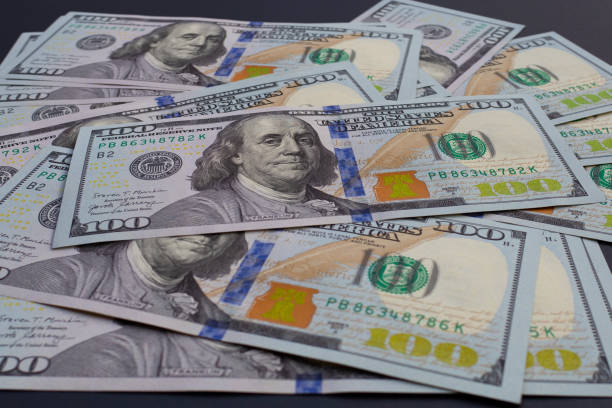 istock One hundred dollar banknotes. Financial concept 1426377273