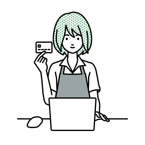 Vector illustration of a woman in cafe apron using laptop computer at her desk and holding a credit card