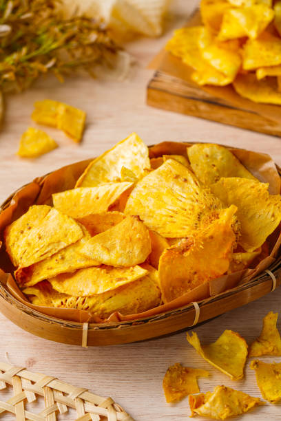 Breadfruit Chips Breadfruit chips (Indonesia : Keripik sukun) are food made from breadfruit which is thinly sliced and then fried until dry and crispy. It tastes salty and is usually given a savory onion aroma. gorengan stock pictures, royalty-free photos & images