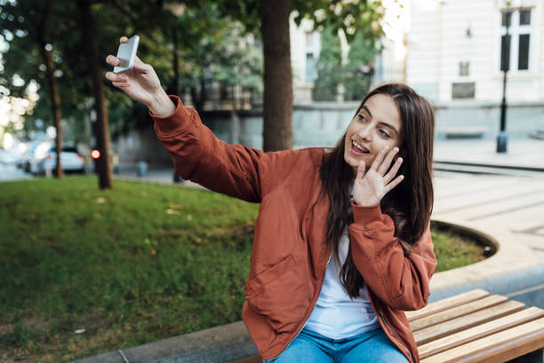 istock Girl talking on mobile phone via video call 1426408048