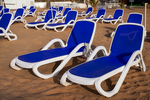 typical hooded beach chairs at a beach in north germany