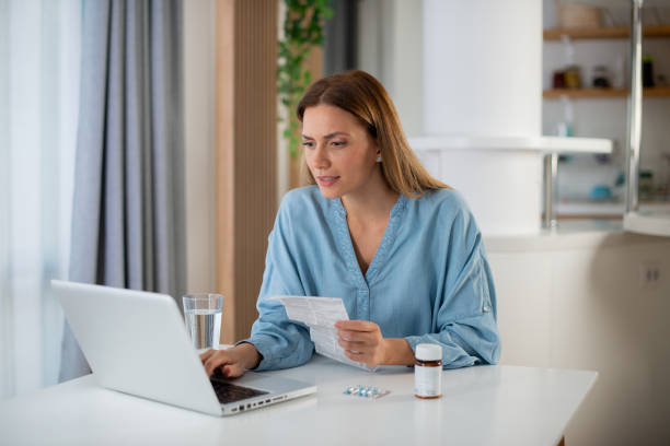 I hope this helps Young woman holding pill online medica supply stock pictures, royalty-free photos & images