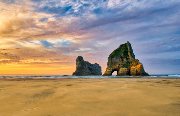 istock The Rock formations off Wharariki beach at Puponga 1426409979