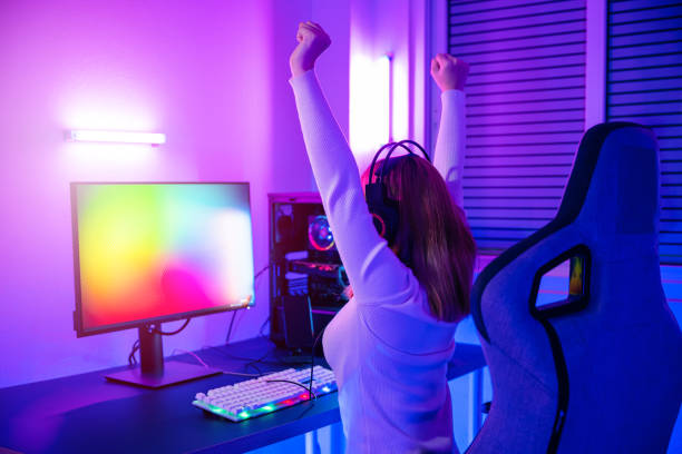 istock Asian gamer playing online video game excited on desktop computer 1426410938