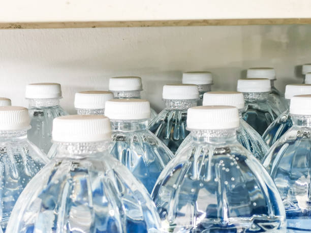 istock Selective focus close up image of mineral water bottle caps. 1426422059