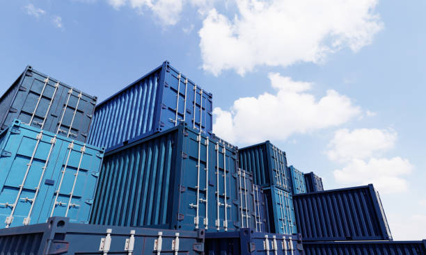 istock Stack of blue container boxes with sky background. Cargo freight shipping for import and export logistics. Business and transportation concept. 3D illustration rendering 1426423504