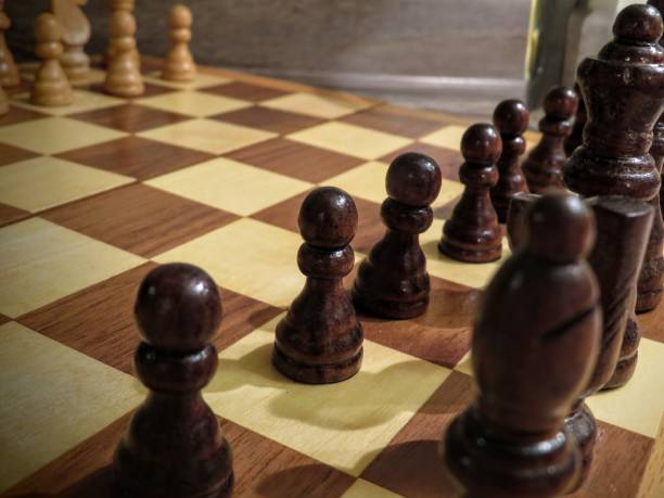 istock Chess Board Beside Glass of Water 1426423562