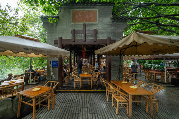 summer terrace with tables and white umbrellas
