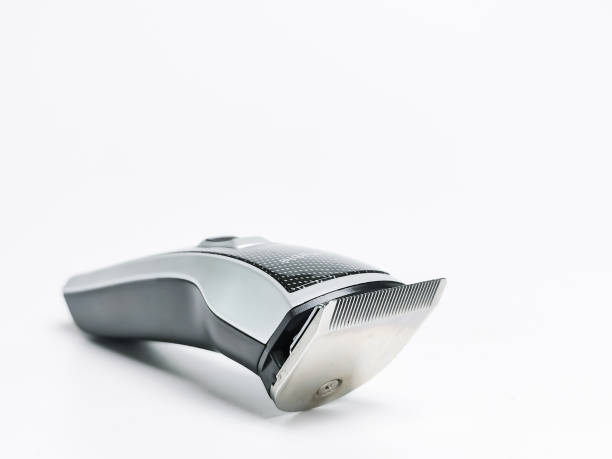 Rechargeable hair clipper against white background.