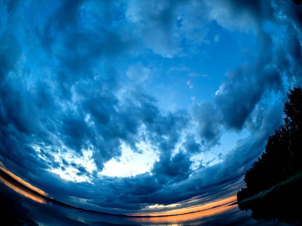 istock cloudy morning sky over a quiet, calm lake 1426432162