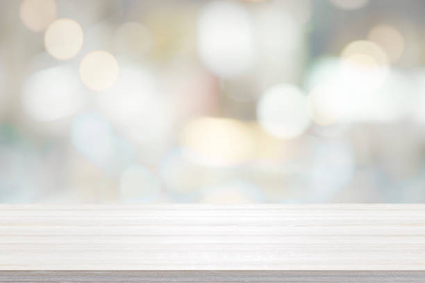 istock Empty wooden table for present product on bokeh blur background image. 1426432177