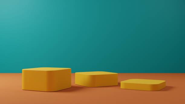 istock 3d rendering yellow pedestal or podium mockup display, empty platform with green backdrop for product showcase 1426434557