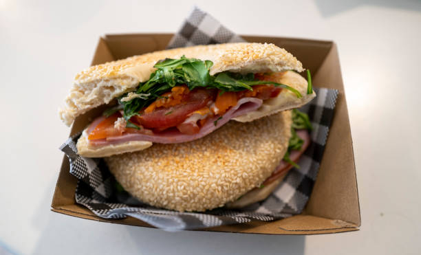 istock Tomato and lettuce and meat on a toasted bagel 1426440301