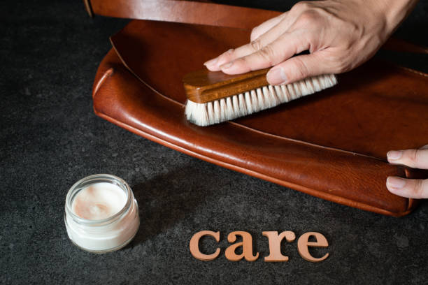 Care for leather bags Care for leather bags leather care stock pictures, royalty-free photos & images