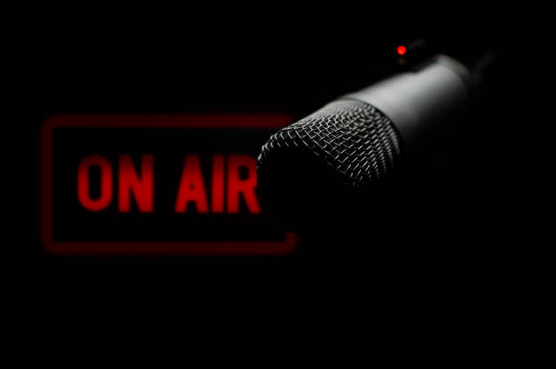istock Professional microphone and on air sign 1426455075
