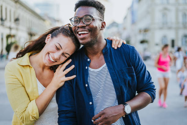 istock Happy couple hugging outdoors. 1426459511