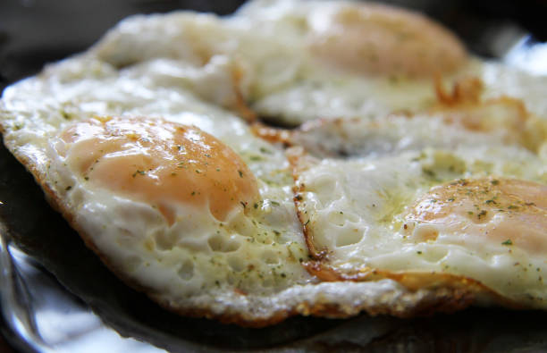 istock Roasted eggs on the black plate and dill over closeup 1426463792