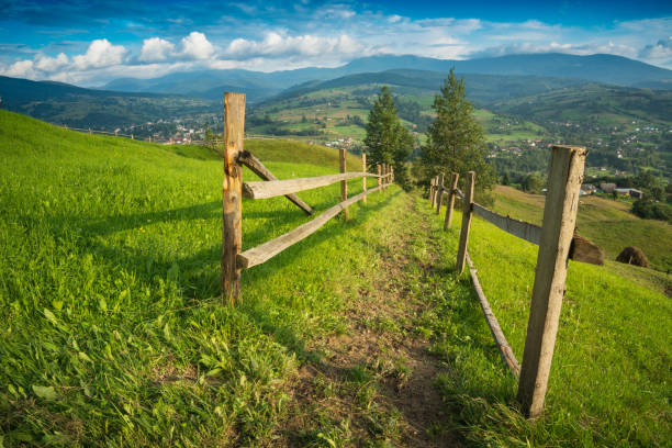 istock Carpathian alpine village with spring grass 1426475809