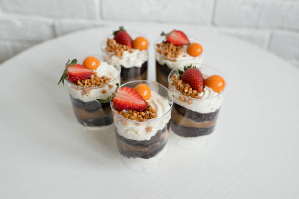 istock Delicious pastries in a cup with berries 1426477754