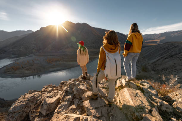 istock Three female hikers at sunset view point 1426479448