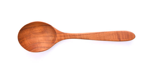 istock wooden spoon on white background. Top view 1426480652