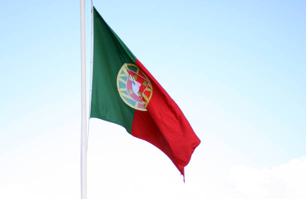 istock Portuguese national flag on a sunny day 1426483059