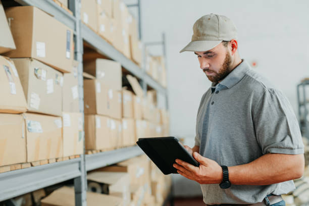 Warehouse manager, digital tablet logistics and shipping box delivery worker, industry man and courier planning factory manufacturing. Online supply stock, export storage and production distribution stock photo