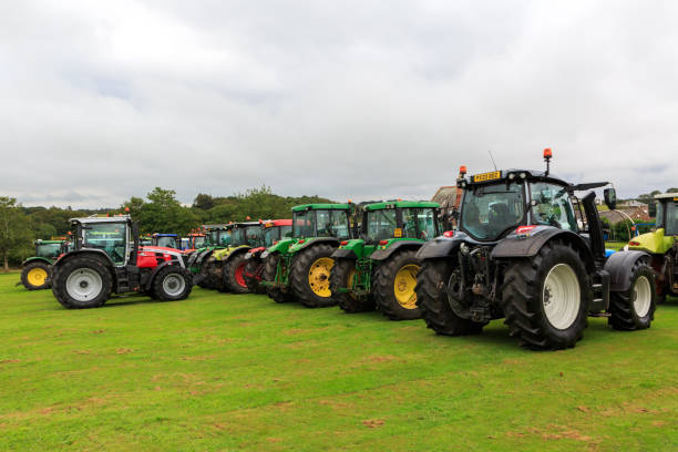Fatehabad, Haryana, India - 8 March, 2020: Second hand tractors, side by side, in a long line at Tractors market in Haryana