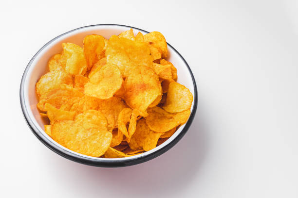 istock Smoked paprika potato chips in a bowl 1426492577
