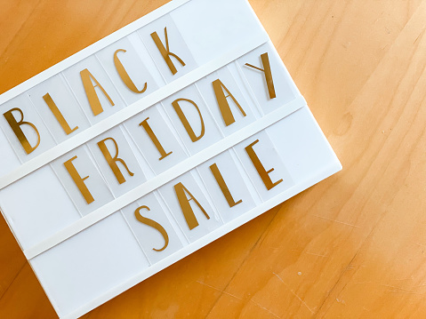 Wooden background with the text Black Friday Sale