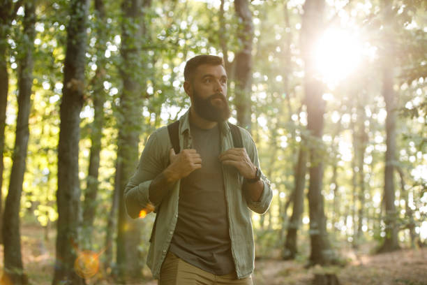 istock Young hipster going on a relaxing hike through the scenic forest 1426514294