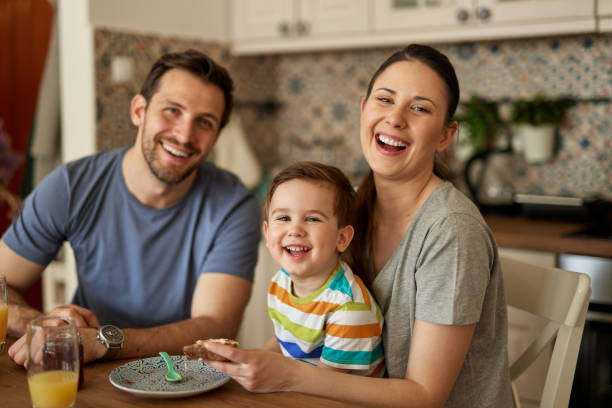 istock Parents spending some quality time with their adorable son at breakfast time 1426514404