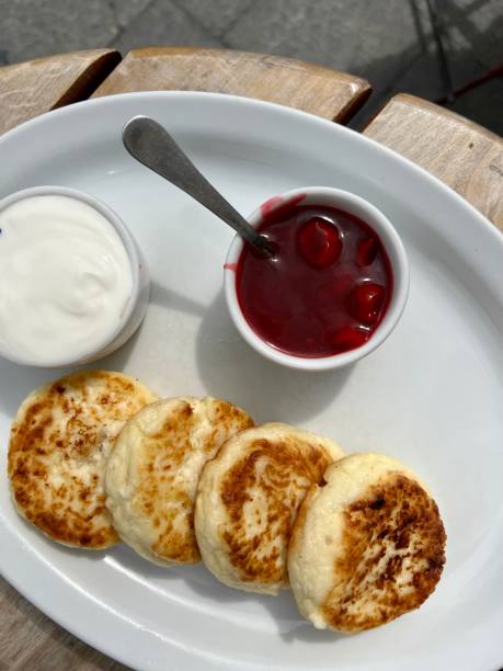 istock cottage cheese pancakes with sour cream and jam 1426533369