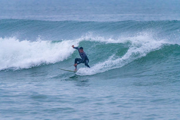 istock Brazilian surfer in action 1426535765