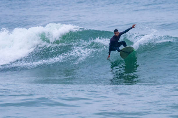 istock Brazilian surfer in action 1426535809
