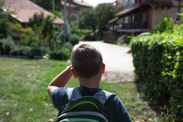 istock Little 7 years schoolboy going to school 1426537107
