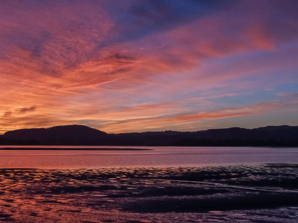 istock Dramatic deep colours of brilliant sunrise 1426543544