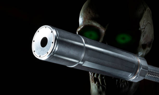 istock Green eyed skull behind a suppressor 1426546574