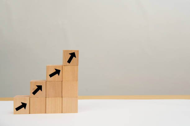 istock arrow stack wood block for business growth concept 1426549436