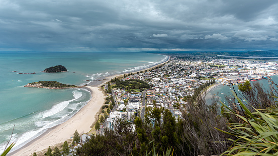 Mount Maunganui town panoramic view on a cloudy view. Coast of Pacific Ocean. New Zealand
