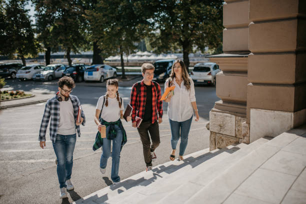 istock Group of friends chatting while arriving on campus 1426557289