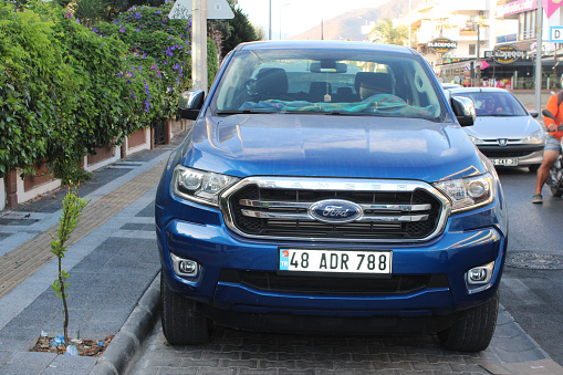 Muğla, Marmaris, Turkey- September 20, 2022: Front view of Ford ranger car on the roadside. Horizontal composition.