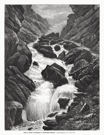 Historical view of the waterfall of the Kander at the entrance to the Gastern valley near Kandersteg in the Bernese Oberland, Switzerland. Wood engraving after a drawing by Joseph Nieriker (Swiss painter and illustrator, 1828 - 1903), published in 1885.
