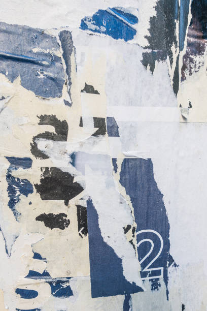 istock Old ripped blank torn grunge posters texture background 1426560445